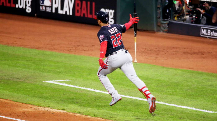 Oct 29, 2019; Houston, TX, USA; Washington Nationals left fielder Juan Soto (22) hits a solo home run against the Houston Astros during the fifth inning in game six of the 2019 World Series at Minute Maid Park. Mandatory Credit: Thomas B. Shea-USA TODAY Sports